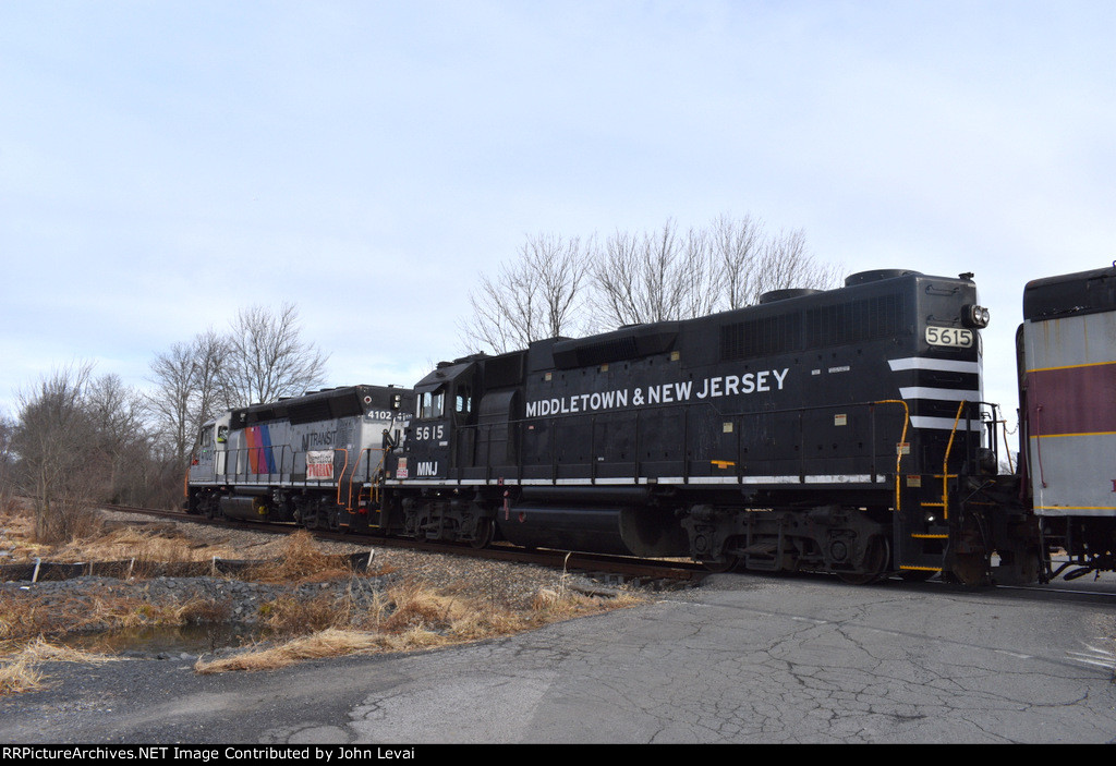 Rear side view of NJT GP40PH-2 # 4102 and M&NJ GP38-2 # 5615